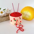 Small beige crochet yarn holder bowl with red tulip flowers Knitter gifts