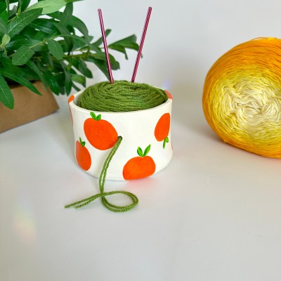 Small crochet yarn bowl with oranges