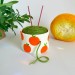 Small crochet yarn bowl with oranges