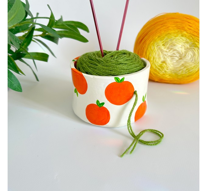 Small crochet yarn bowl with oranges