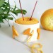 Small crochet yarn bowl with chanterelle mushrooms