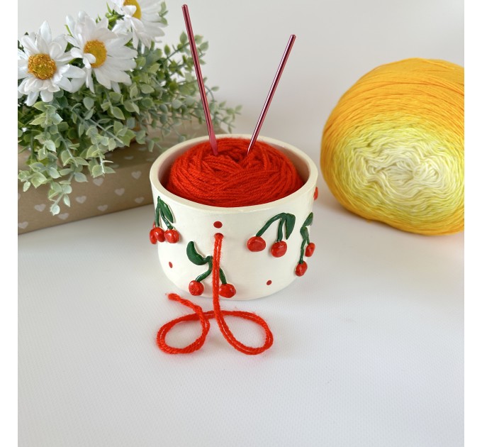 Small milky white crochet yarn holder bowl with red cherries and dots Knitters crocheters